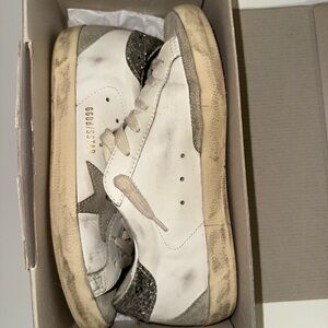 Golden Goose Woman’s Super-Star with gray and silver glitter heel tab